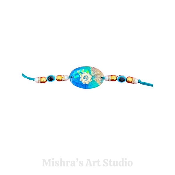Elegant Ocean Blue Resin Rakhi-Om | Oval